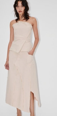 El Encanto Atemporal de los Zara Vestidos Midi en la Escena de la Moda